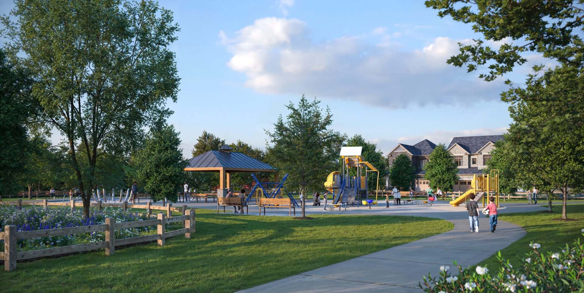 Families walking through the community park at Park and Lake
